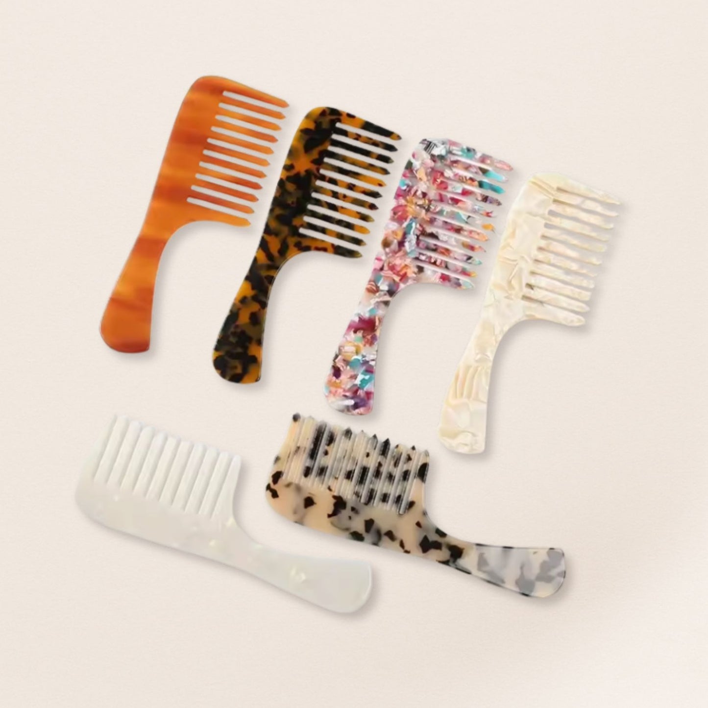Set of six marbled wide-tooth combs for gentle detangling, displayed on a beige background.