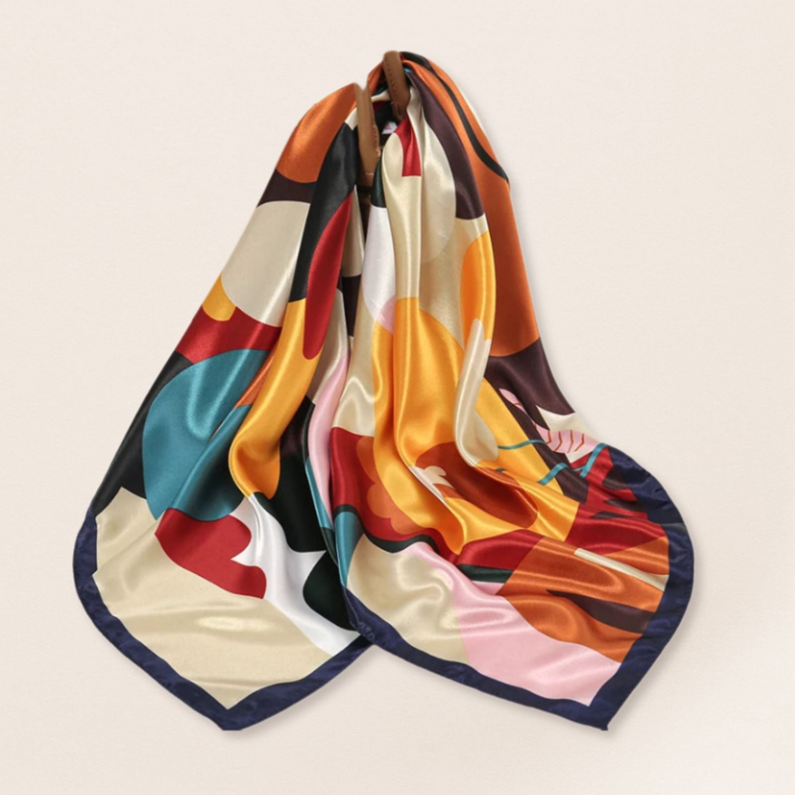Colourful scarf with abstract design on a beige background