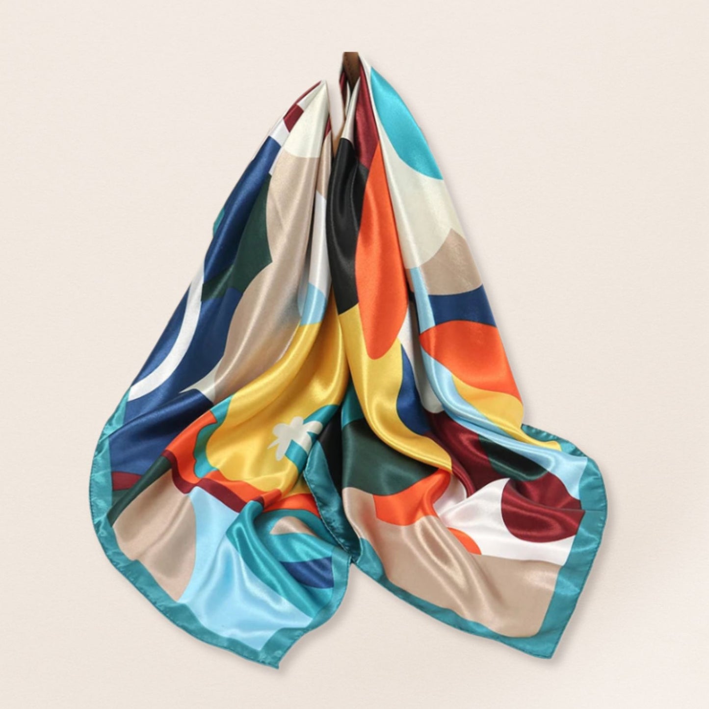 Colourful patterned scarf on a beige background