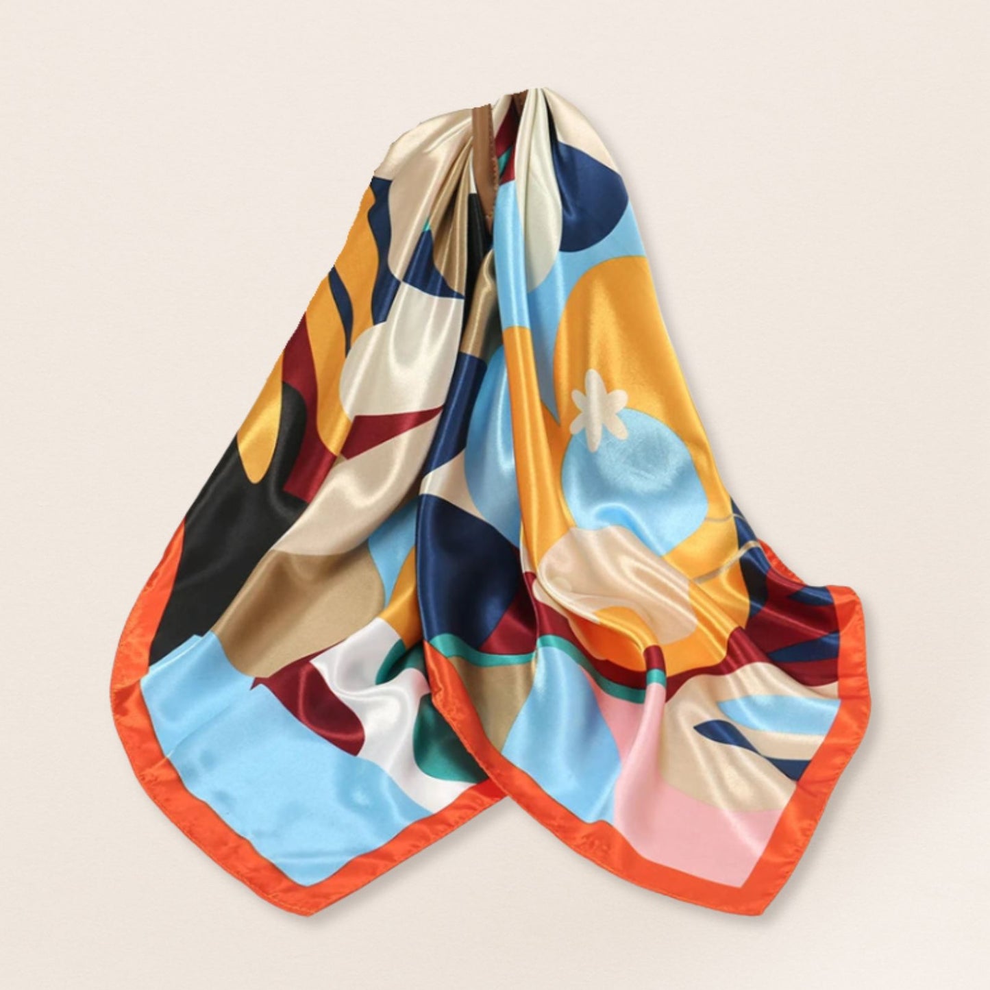Colourful scarf with abstract pattern on a beige background