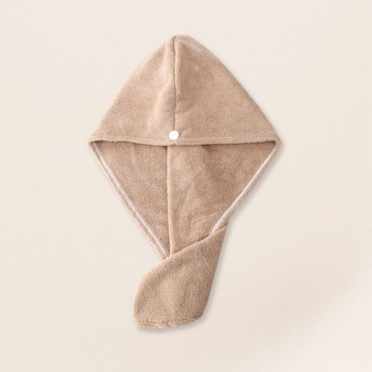 Beige microfiber towel for fine hair on a beige background