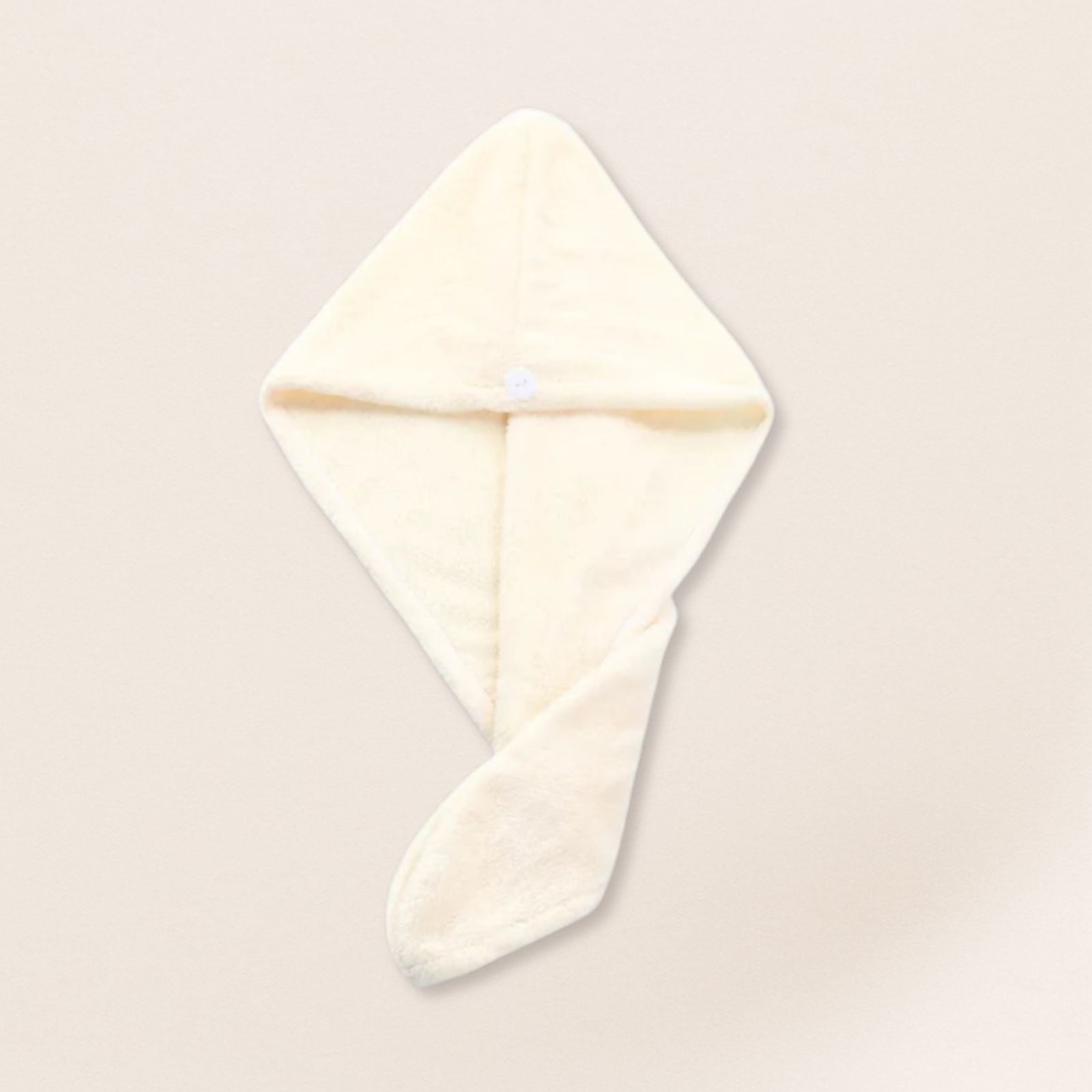 White microfiber towel for fine hair on a beige background