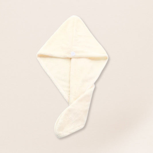 White microfiber towel for fine hair on a beige background