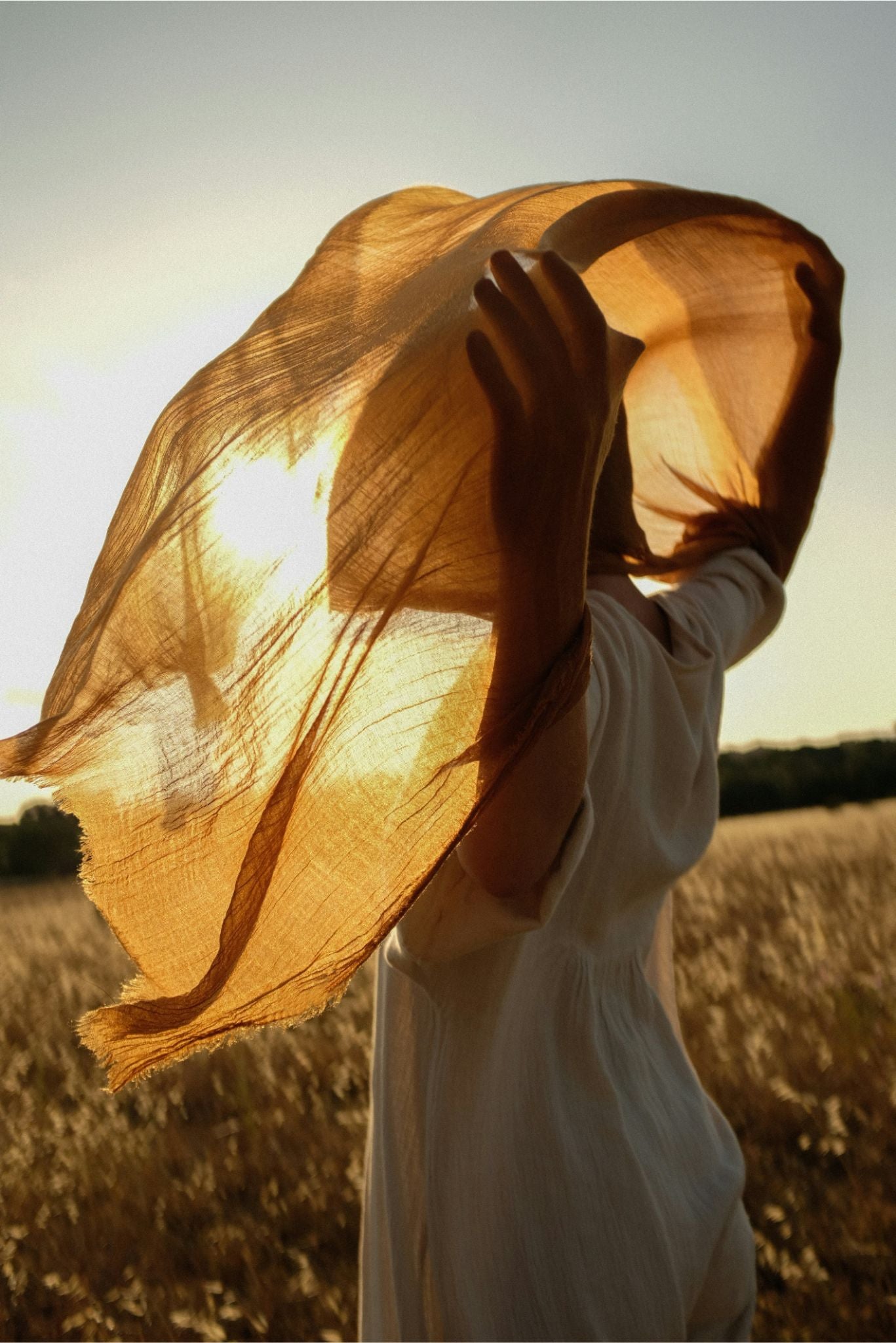 Soft flowing fabric with sun reflection, a symbol of lightness